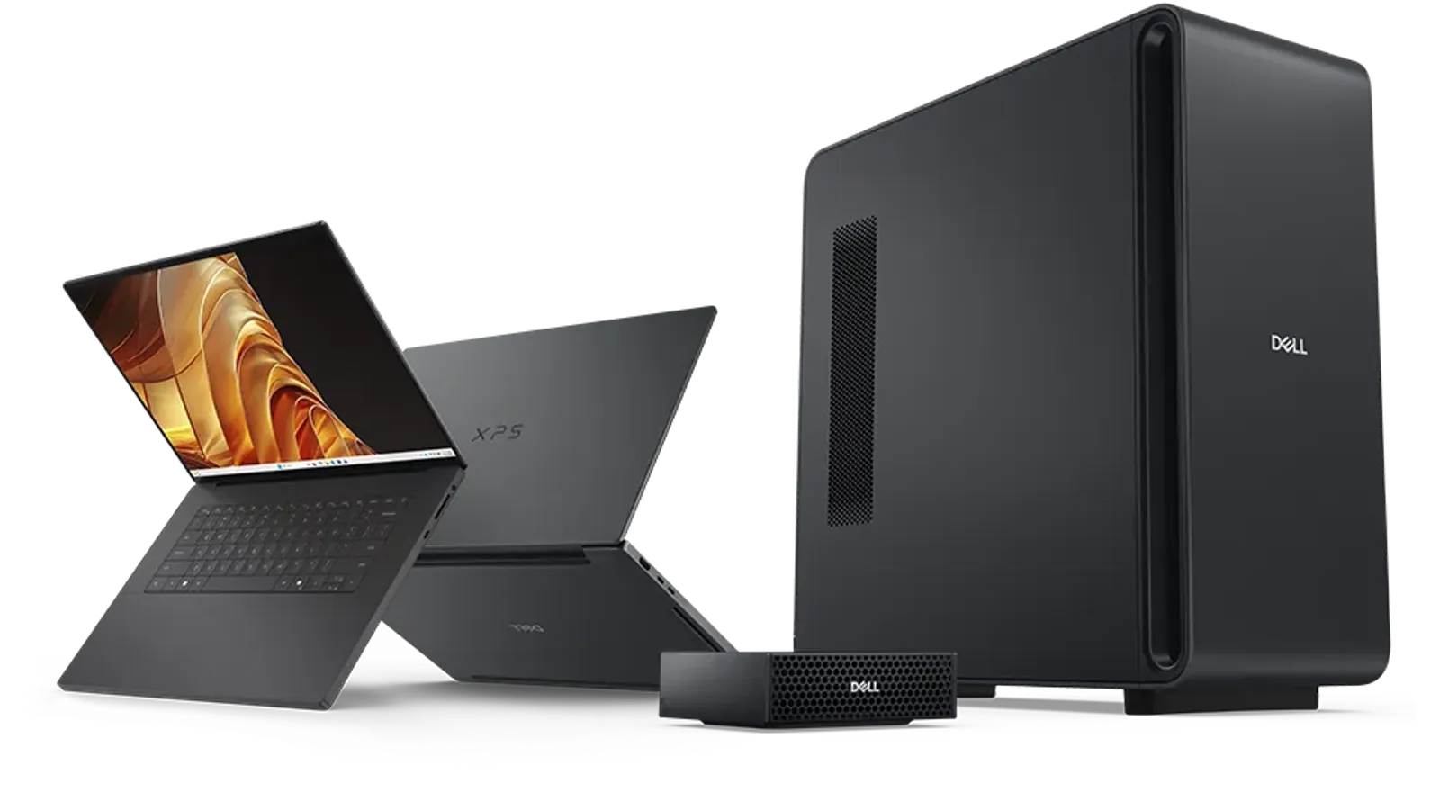 XPS 16 Creator Edition สองเครื่องวางคู่กับเดสก์ท็อปขนาดเล็กและเวิร์กสเตชันทาวเวอร์สีดำของ Dell