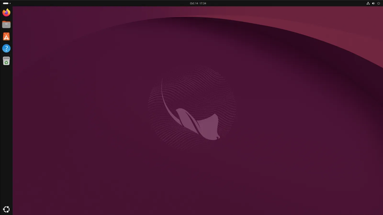 หน้าจอเดสก์ท็อป Ubuntu 26.10 Stonking Stingray พร้อมวอลเปเปอร์ปลากระเบนสีม่วงแดงและแถบ Dock ด้านซ้าย