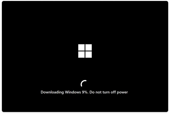 หน้าจอแสดงความคืบหน้า Downloading Windows พร้อมคำเตือนห้ามปิดเครื่อง