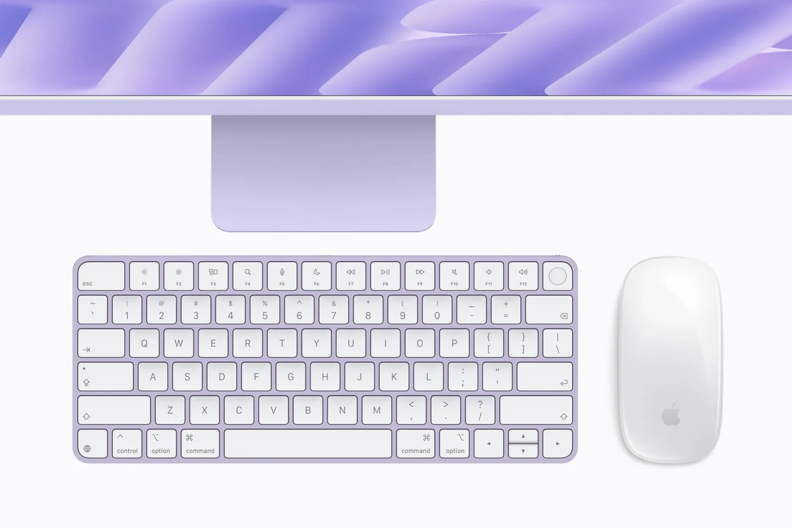 Magic Keyboard และ Magic Mouse สีเข้าชุดกับ iMac สีม่วง
