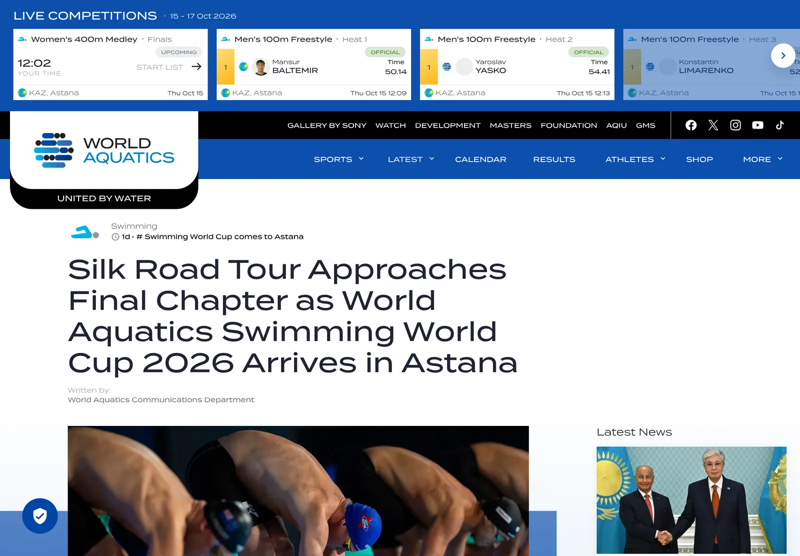 ภาพหน้าจอข่าว World Aquatics หัวข้อ Silk Road Tour Approaches Final Chapter as World Aquatics Swimming World Cup 2026 Arrives in Astana พร้อมแถบผลสดรอบคัดเลือกที่อัสตานา 15 ตุลาคม 2026